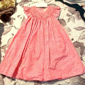 Beautiful pink dress with underpants.